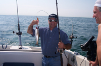 Andre will be back next year. He holds the smallest shaker salmon of the day, and then he landed  his big chinook Salmon at the end of the day